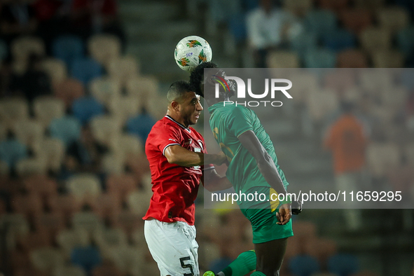 Ramy Rabiaa of Egypt battles for possession with Papa Ndiaga Yade of Mauritania during the Africa Cup of Nations Qualifiers 2025, match numb...