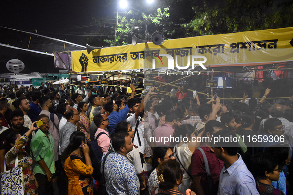 Citizens attend the Junior Doctors hunger strike to protest the rape and murder case of a medic in a government-run hospital in Kolkata, Ind...