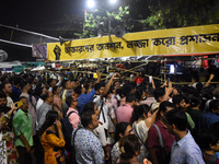 Citizens attend the Junior Doctors hunger strike to protest the rape and murder case of a medic in a government-run hospital in Kolkata, Ind...