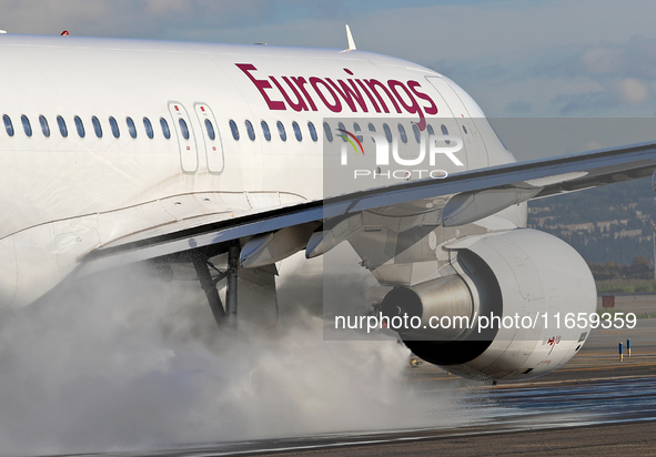 An Airbus A320-214 from Eurowings is on the runway ready to take off from Barcelona airport in Barcelona, Spain, on October 8, 2024. 