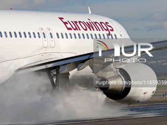 An Airbus A320-214 from Eurowings is on the runway ready to take off from Barcelona airport in Barcelona, Spain, on October 8, 2024. (