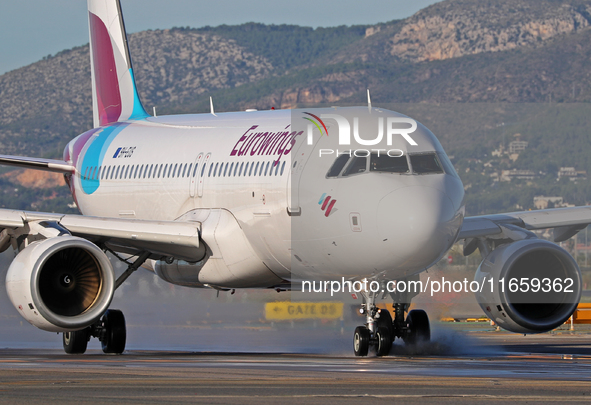 An Airbus A320-214 from Eurowings is on the runway ready to take off from Barcelona airport in Barcelona, Spain, on October 8, 2024. 