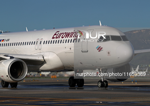 An Airbus A320-214 from Eurowings is on the runway ready to take off from Barcelona airport in Barcelona, Spain, on October 8, 2024. 