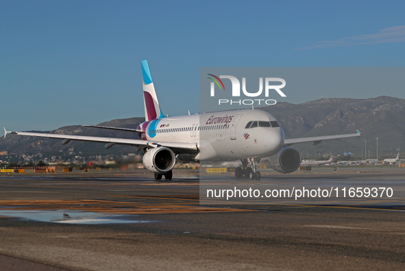 An Airbus A320-214 from Eurowings is on the runway ready to take off from Barcelona airport in Barcelona, Spain, on October 8, 2024. 