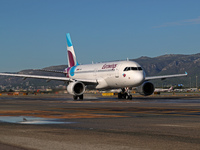 An Airbus A320-214 from Eurowings is on the runway ready to take off from Barcelona airport in Barcelona, Spain, on October 8, 2024. (