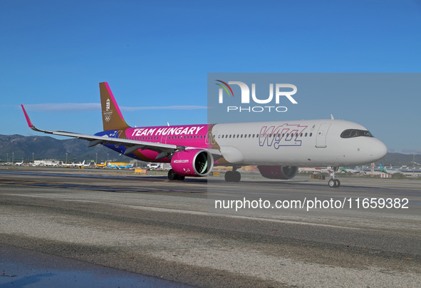 An Airbus A321-271NX from Wizz Air is on the runway ready to take off from Barcelona airport in Barcelona, Spain, on October 8, 2024. 