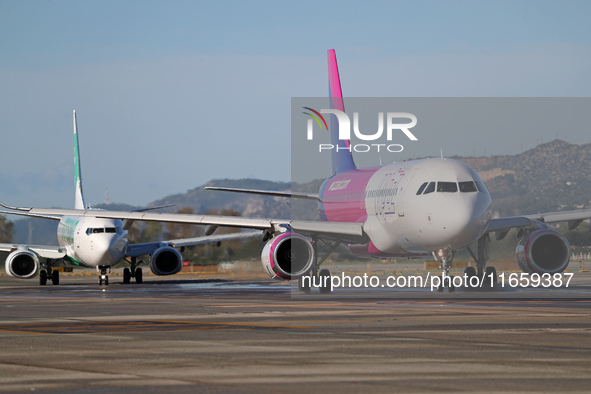 An Airbus A320-232 from Wizz Air is on the runway ready to take off from Barcelona airport in Barcelona, Spain, on October 8, 2024. 