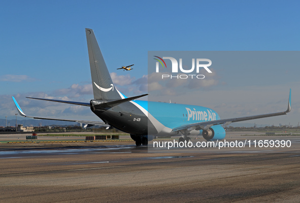 A Boeing 737-8AS(SF) from Amazon Air is on the runway ready to take off from Barcelona airport in Barcelona, Spain, on October 8, 2024. 