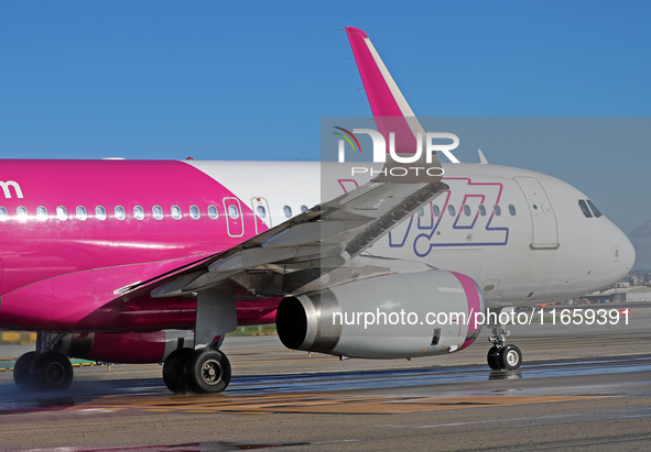 An Airbus A320-232 from Wizz Air is on the runway ready to take off from Barcelona airport in Barcelona, Spain, on October 8, 2024. 