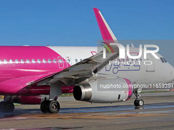 An Airbus A320-232 from Wizz Air is on the runway ready to take off from Barcelona airport in Barcelona, Spain, on October 8, 2024. (