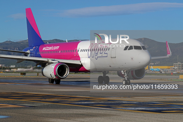 An Airbus A320-232 from Wizz Air is on the runway ready to take off from Barcelona airport in Barcelona, Spain, on October 8, 2024. 