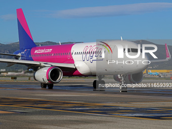 An Airbus A320-232 from Wizz Air is on the runway ready to take off from Barcelona airport in Barcelona, Spain, on October 8, 2024. (