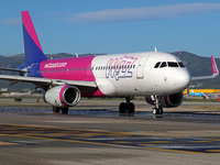 An Airbus A320-232 from Wizz Air is on the runway ready to take off from Barcelona airport in Barcelona, Spain, on October 8, 2024. (