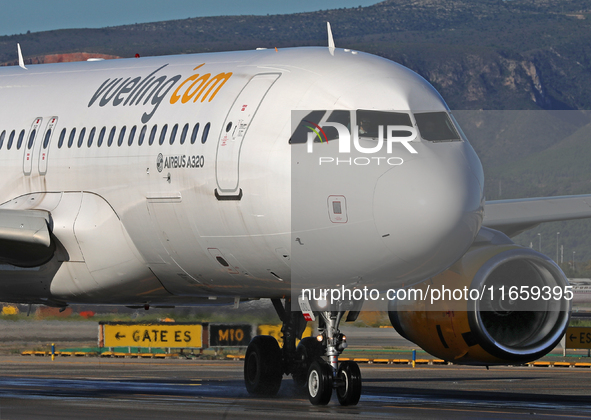 An Airbus A320-232 from Vueling is on the runway ready to take off from Barcelona airport in Barcelona, Spain, on October 8, 2024. 