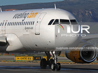 An Airbus A320-232 from Vueling is on the runway ready to take off from Barcelona airport in Barcelona, Spain, on October 8, 2024. (