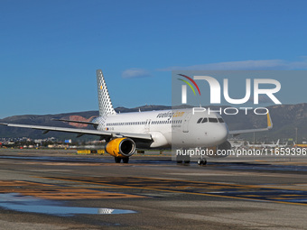 An Airbus A320-232 from Vueling is on the runway ready to take off from Barcelona airport in Barcelona, Spain, on October 8, 2024. (