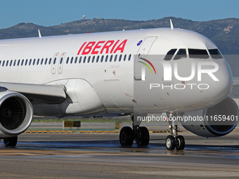 An Airbus A320-214 from Iberia is on the runway ready to take off from Barcelona airport in Barcelona, Spain, on October 8, 2024. (