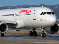 An Airbus A320-214 from Iberia is on the runway ready to take off from Barcelona airport in Barcelona, Spain, on October 8, 2024. (