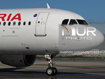 An Airbus A320-214 from Iberia is on the runway ready to take off from Barcelona airport in Barcelona, Spain, on October 8, 2024. (