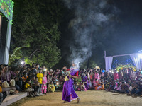 Bengali Hindu devotees watch a dance performance in front of an idol of the goddess Durga during the Durga Puja festival in Sylhet, Banglade...