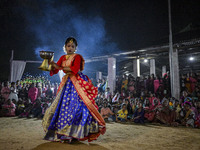 Female dance performers perform in front of an idol of the goddess Durga during the Durga Puja festival in Sylhet, Bangladesh, on October 12...