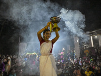 Female dance performers perform in front of an idol of the goddess Durga during the Durga Puja festival in Sylhet, Bangladesh, on October 12...