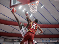 Momo Diouf of Virtus Bologna plays against Aamir Simms of Umana Reyer during the Italian LBA basketball championship match between Umana Rey...