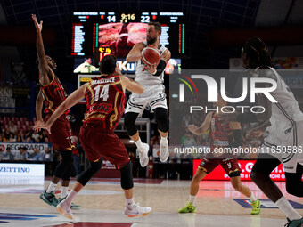 Marco Belinelli of Virtus Bologna plays against Giga Janelidze of Umana Reyer during the Italian LBA basketball championship match between U...