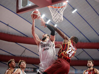 Tornik'e Shengelia of Virtus Bologna plays against Carl Wheatle of Umana Reyer during the Italian LBA basketball championship match between...