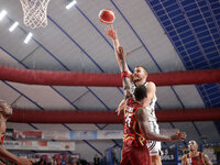 Ante Zizic of Virtus Bologna competes against Aamir Simms of Umana Reyer during the Italian LBA basketball championship match between Umana...