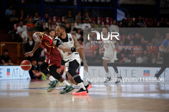 Umana Reyer's Carl Wheatle competes against Virtus Bologna's Rayjon Tucker during the Italian LBA basketball championship match between Uman...