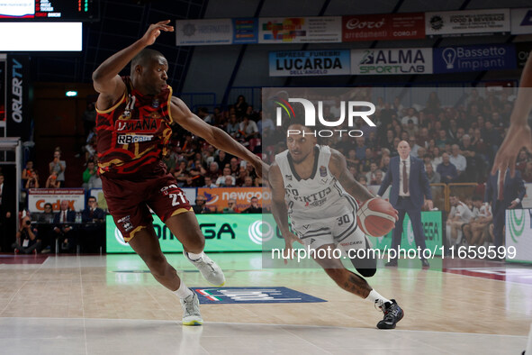 Matt Morgan of Virtus Bologna plays against Mfiondo Kabangele of Umana Reyer during the Italian LBA basketball championship match between Um...