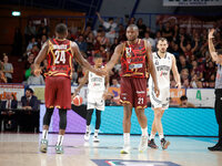 Umana Reyer's Mfiondo Kabangele and Umana Reyer's Carl Wheatle participate in the Italian LBA basketball championship match between Umana Re...