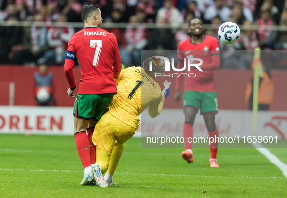 Cristiano Ronaldo , Lukasz Skorupski  during UEFA Nations League match Poland vs Portugal in Warsaw Poland on 12 October 2024. 