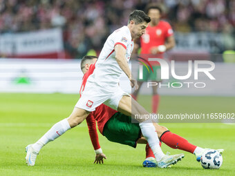 Diogo Dalot , Robert Lewandowski  during UEFA Nations League match Poland vs Portugal in Warsaw Poland on 12 October 2024. (