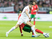 Diogo Dalot , Robert Lewandowski  during UEFA Nations League match Poland vs Portugal in Warsaw Poland on 12 October 2024. (