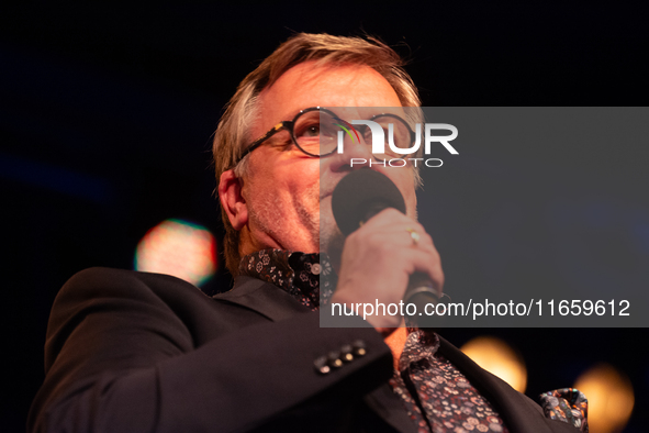 Hape Kerkeling, a German author, appears on the stage of the theater of Tanzbrunnen in Cologne, Germany, on October 12, 2024, during the lit...