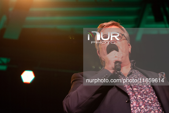 Hape Kerkeling, a German author, appears on the stage of the theater of Tanzbrunnen in Cologne, Germany, on October 12, 2024, during the lit...