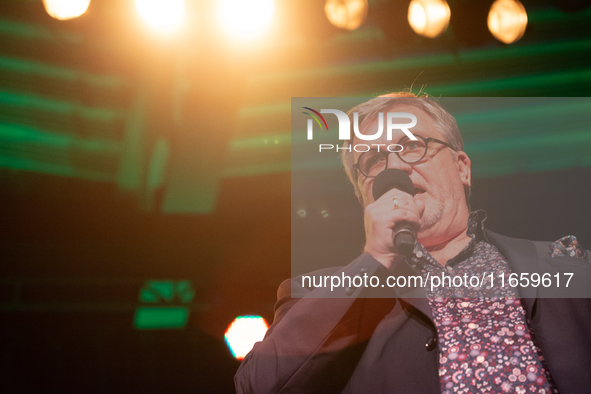 Hape Kerkeling, a German author, appears on the stage of the theater of Tanzbrunnen in Cologne, Germany, on October 12, 2024, during the lit...