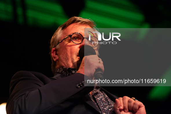 Hape Kerkeling, a German author, appears on the stage of the theater of Tanzbrunnen in Cologne, Germany, on October 12, 2024, during the lit...