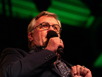 Hape Kerkeling, a German author, appears on the stage of the theater of Tanzbrunnen in Cologne, Germany, on October 12, 2024, during the lit...