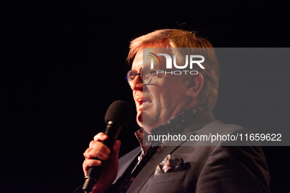 Hape Kerkeling, a German author, appears on the stage of the theater of Tanzbrunnen in Cologne, Germany, on October 12, 2024, during the lit...