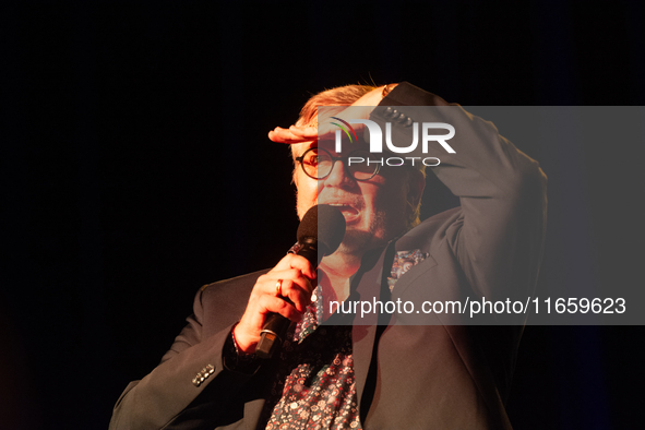 Hape Kerkeling, a German author, appears on the stage of the theater of Tanzbrunnen in Cologne, Germany, on October 12, 2024, during the lit...