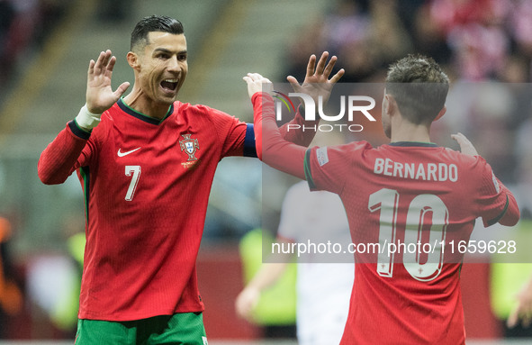 Cristiano Ronaldo , Bernardo Silva , goal celebration during UEFA Nations League match Poland vs Portugal in Warsaw Poland on 12 October 202...