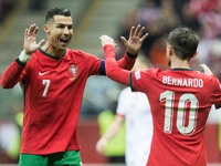 Cristiano Ronaldo , Bernardo Silva , goal celebration during UEFA Nations League match Poland vs Portugal in Warsaw Poland on 12 October 202...