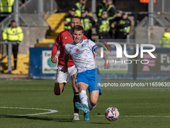 Dean Campbell plays during the Sky Bet League 2 match between Barrow and Morecambe at Holker Street in Barrow-in-Furness, England, on Octobe...