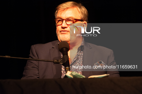 Hape Kerkeling, a German author, appears on the stage of the theater of Tanzbrunnen in Cologne, Germany, on October 12, 2024, during the lit...