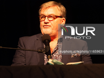 Hape Kerkeling, a German author, appears on the stage of the theater of Tanzbrunnen in Cologne, Germany, on October 12, 2024, during the lit...