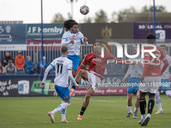 Barrow's Neo Eccleston challenges for a header with Morecambe's Marcus Dackers during the Sky Bet League 2 match between Barrow and Morecamb...