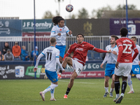 Barrow's Neo Eccleston challenges for a header with Morecambe's Marcus Dackers during the Sky Bet League 2 match between Barrow and Morecamb...